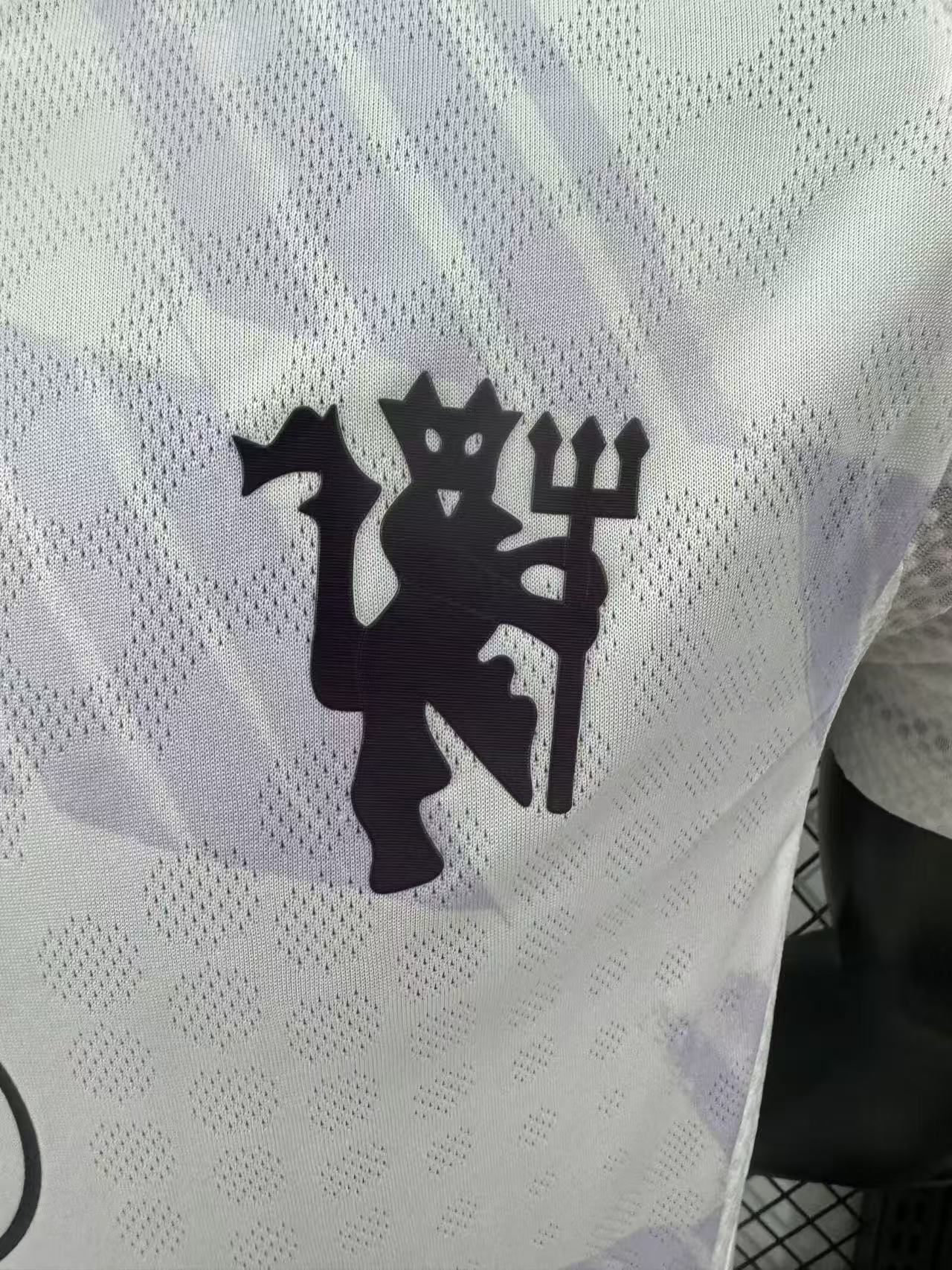 25/26 Manchester United away jersey